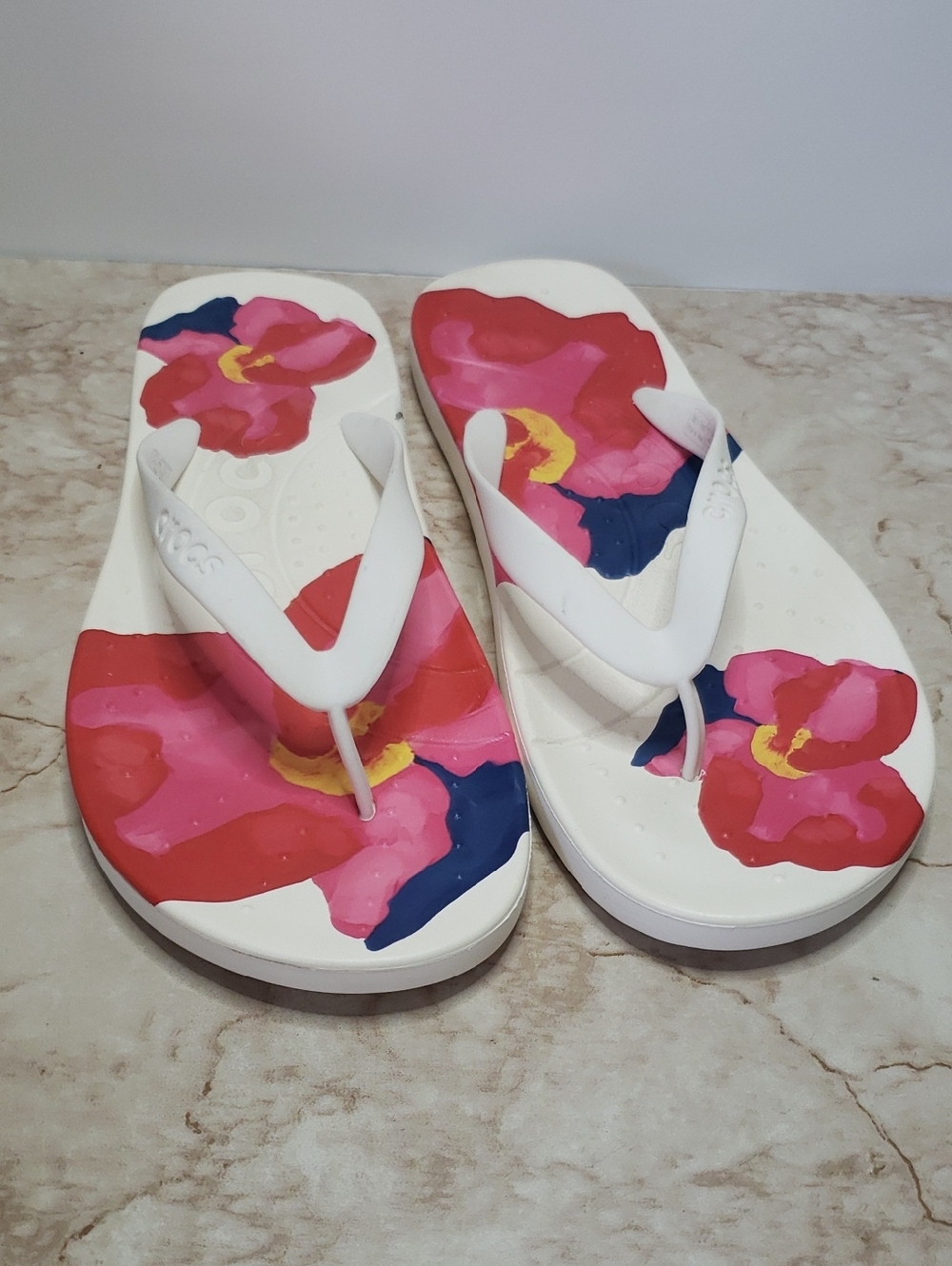 Crocs Women’s Floral White Flip Flops with Pink & Red Accents Size 9